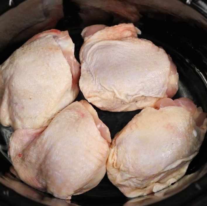 Put chicken in a slow cooker, but what goes on top turns it into an irresistible family meal.