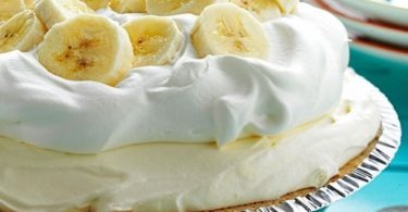 Ingredients 1 (6 oz) ready-to-use shortbread or graham cracker crumb crust 2 small boxes (3.4 oz each) banana cream instant pudding 2 cups half & half 1 bar (8 oz) cream cheese softened 1/3 cup granulated sugar 1 carton (8 oz) Cool Whip thawed sliced bananas & mini Nilla wafers for garnish Instructions In a mixing bowl, combine the dry pudding mix and half & half. Stir with a wire whisk for about 1-2 minutes or until the pudding mix is completely dissolved. Let it sit for a few minutes in the bowl so it can thicken up. Spread 1½ cups of the banana pudding into the bottom of the pie crust. Set aside the remaining half of pudding mix. In a mixing bowl, add the softened cream cheese and granulated sugar. Beat until combined and creamy. Add the Cool Whip and mix until combined. Add half of the Cool Whip mixture into the remaining half of banana pudding mix. Stir together. Spread this evenly over the 1st layer in the pie crust. Spread the remaining Cool Whip mixture on top of the pie for the 3rd layer. * If wanted, save the 3rd layer in the fridge and then you can pipe it on top of the pie before serving (as pictured in the post). Cover the pie with the enclosed plastic lid from the crust. Refrigerate for 8 hours or overnight.