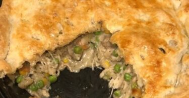 Crafted from the ground up, this scrumptious chicken pot pie features a homemade blend of carrots, peas, and celery encased in a ready-made crust.