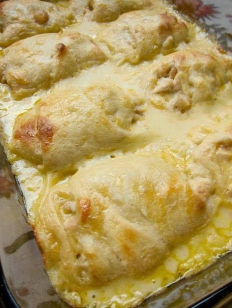 Ingredients: 6 oz cooked chicken breast, chopped 1 can crescent rolls 1 can cream of chicken soup 1/2 cup milk 1/2 cup cheese Directions: Preheat oven to 350. Lightly spray a 9×13-inch pan with cooking spray. Mix together milk, soup and cheese – set aside. Separate crescent rolls into 8 triangles. Top the large part of the crescent triangle with the chopped chicken. Top each crescent roll with 1 tsp of soup mixture. Roll crescent rolls up. Spread approximately 1/3 cup of soup mixture in bottom of 9×13 dish. Place crescent rolls in dish. Pour remaining soup mixture over crescent rolls. Bake for 30 minutes or until bubbly.