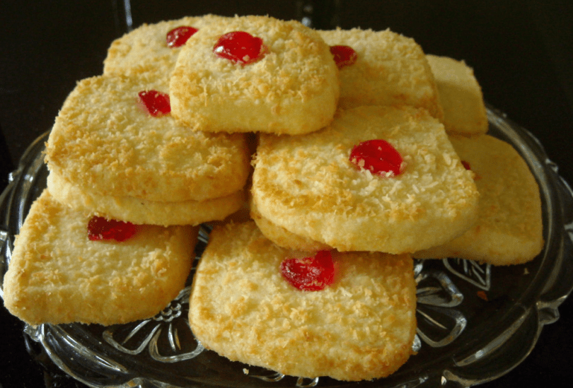 Ingredients 1 cup butter, softened 3/4 cup sugar 1 teaspoon vanilla extract 1-3/4 cups all-purpose flour 1 cup sweetened shredded coconut Directions In a large bowl, cream butter and sugar until light and fluffy, 5-7 minutes. Beat in vanilla. Gradually beat flour into creamed mixture. Stir in coconut. Using a sheet of waxed paper, shape dough into a 12x3x1-in. rectangle. Wrap in waxed paper; refrigerate 3 hours or overnight. Preheat oven to 300°. Unwrap and cut dough crosswise into 1/4-in. slices. Place 1 in. apart on ungreased baking sheets. Bake until edges are light golden, 18-20 minutes. Cool on pans 5 minutes. Remove to wire racks to cool.