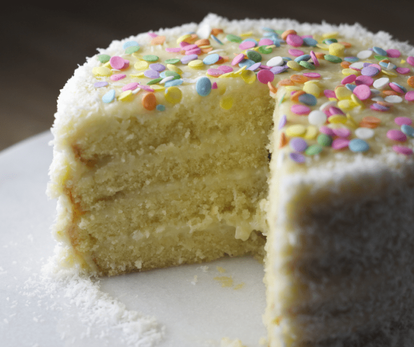 Creamy Coconut Cake with Shredded Coconut Topping