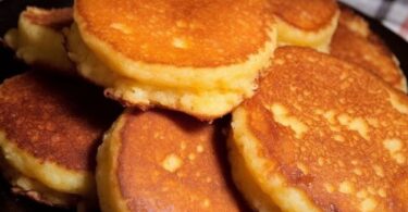 Discover the history and indulgence of Southern Cornmeal Hoecakes – a beloved, crispy fried cornbread recipe with deep Southern heritage. Learn how to make this classic dish and enjoy it for breakfast, lunch, or dinner with various delicious toppings. This recipe will transform your culinary experience and bring a taste of the South to your table. Save this treasured Southern Cornmeal Hoecakes recipe for future use!