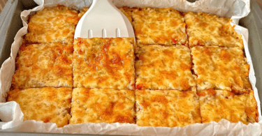 oven-baked cheesy potato pancakes in sheet pan